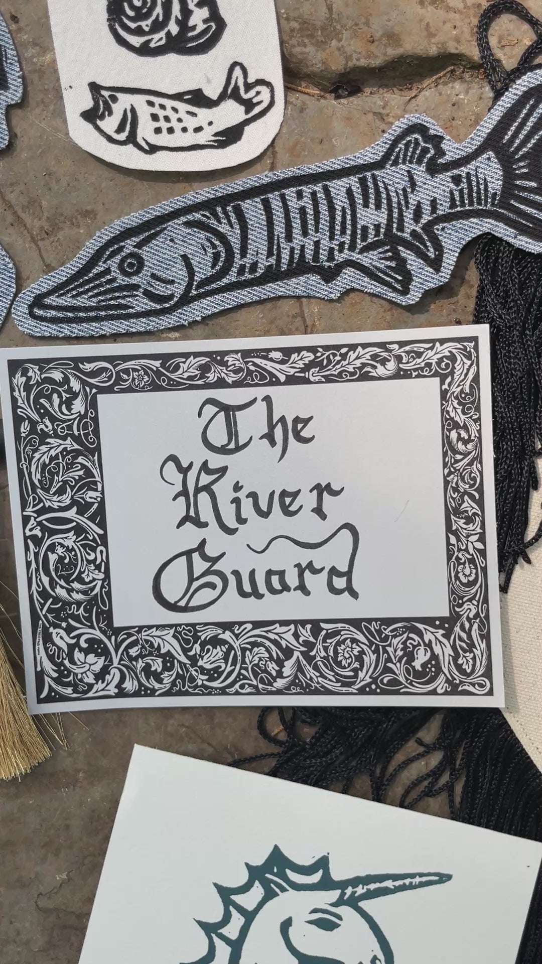 A collection of linocut art prints, iron-on patches and accessories inspired by the creatures of the Green River.